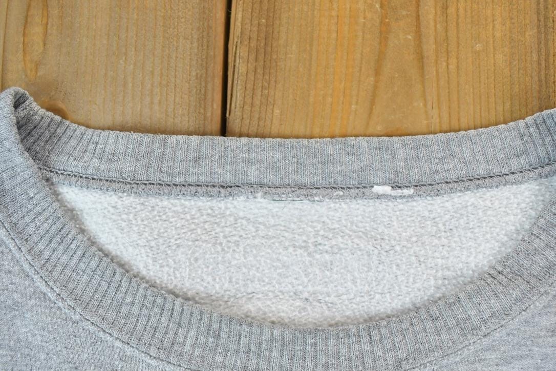 Proper Vintage Clothing > Gender Neutral Adult Clothing > Hoodies & Sweatshirts > Sweatshirts Vintage 1990s Minnesota Wild NHL CCM Hockey Crewneck Sweatshirt / Made In USA / Vintage Sportswear / Embroidered / Hockey