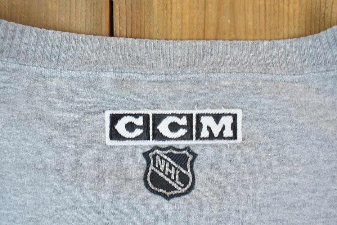 Proper Vintage Clothing > Gender Neutral Adult Clothing > Hoodies & Sweatshirts > Sweatshirts Vintage 1990s Minnesota Wild NHL CCM Hockey Crewneck Sweatshirt / Made In USA / Vintage Sportswear / Embroidered / Hockey