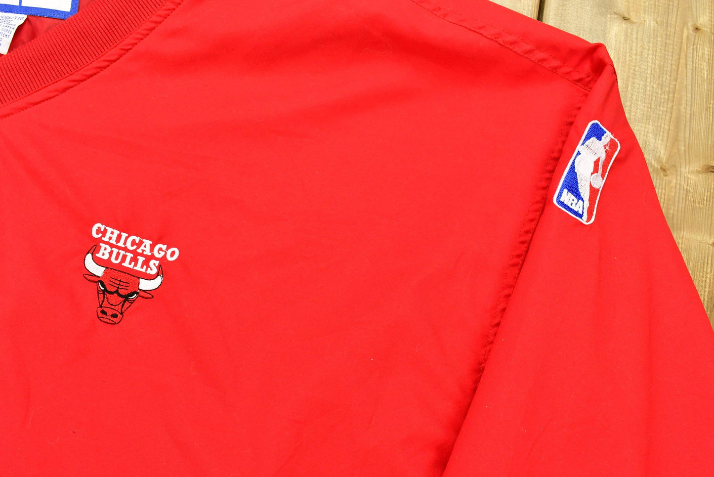 Proper Vintage Clothing > Gender Neutral Adult Clothing > Jackets & Coats Vintage 1990s Chicago Bulls NBA Windbreaker Jacket / Team Logo / Athletic Sportswear / Logo Athletic / Streetwear / Pullover / Athleisure