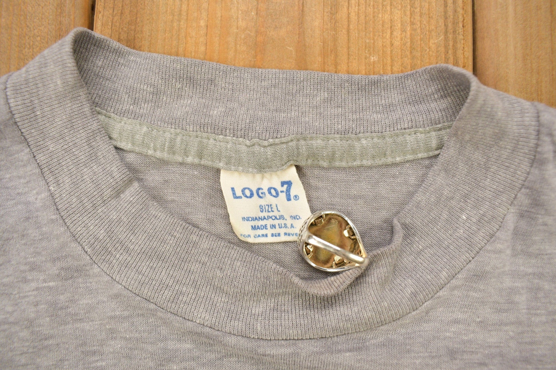 Proper Vintage Clothing > Gender Neutral Adult Clothing > Tops & Tees > T Shirts Vintage 1970s Cleveland Browns NFL Logo 7 Graphic T-Shirt / Made In USA / Single Stitch / NFL / Sportswear / 1970s Football T Shirt