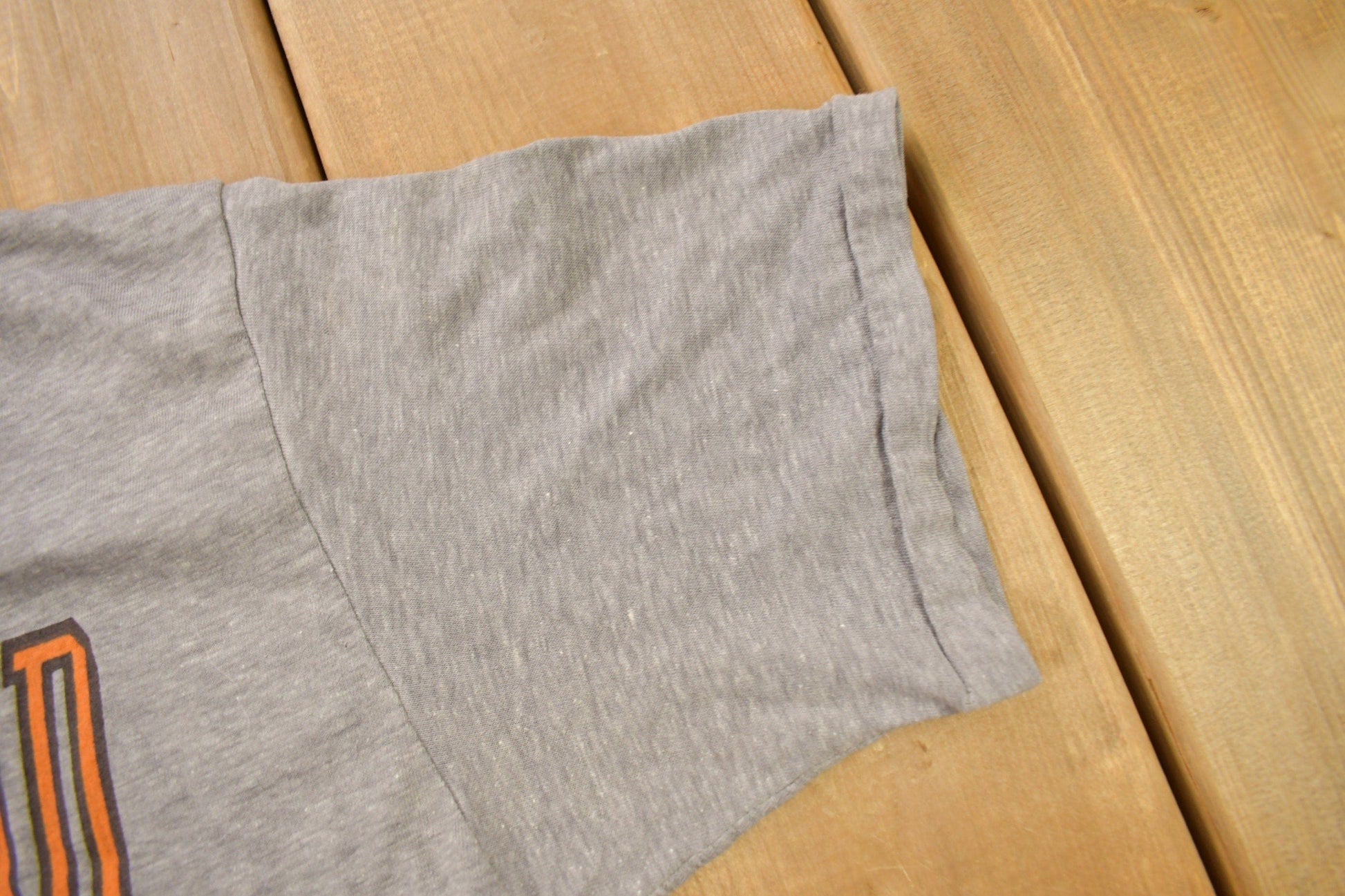 Proper Vintage Clothing > Gender Neutral Adult Clothing > Tops & Tees > T Shirts Vintage 1970s Cleveland Browns NFL Logo 7 Graphic T-Shirt / Made In USA / Single Stitch / NFL / Sportswear / 1970s Football T Shirt