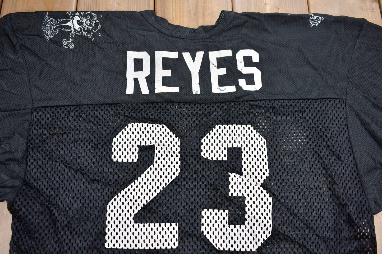 Proper Vintage Clothing > Gender Neutral Adult Clothing > Tops & Tees > T Shirts Vintage 1980s Body Works Fitness Studio Graphic Jersey / Vintage Jersey / Reyes #23 / Made In USA / 90s Graphic Tee