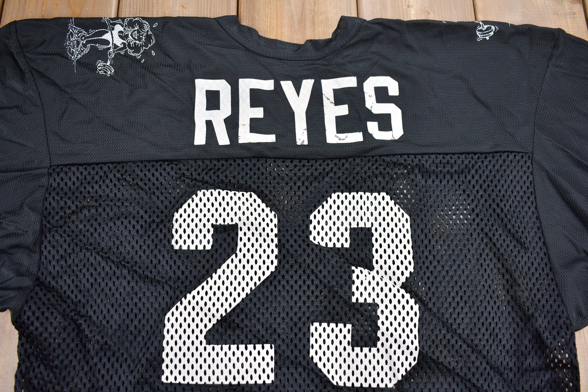 Proper Vintage Clothing > Gender Neutral Adult Clothing > Tops & Tees > T Shirts Vintage 1980s Body Works Fitness Studio Graphic Jersey / Vintage Jersey / Reyes #23 / Made In USA / 90s Graphic Tee