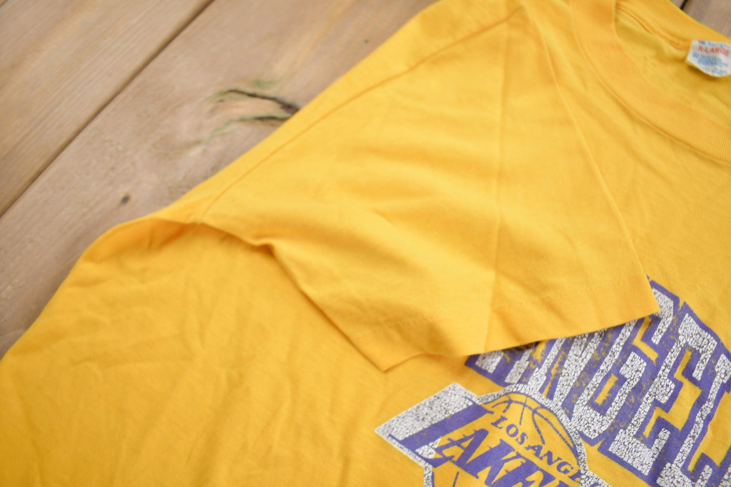 Proper Vintage Clothing > Gender Neutral Adult Clothing > Tops & Tees > T Shirts Vintage 1980s Los Angeles Lakers NBA Champion T-Shirt / Made In USA / Single Stitch / NBA Basketball / Vintage Champion / Sportswear