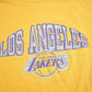 Proper Vintage Clothing > Gender Neutral Adult Clothing > Tops & Tees > T Shirts Vintage 1980s Los Angeles Lakers NBA Champion T-Shirt / Made In USA / Single Stitch / NBA Basketball / Vintage Champion / Sportswear