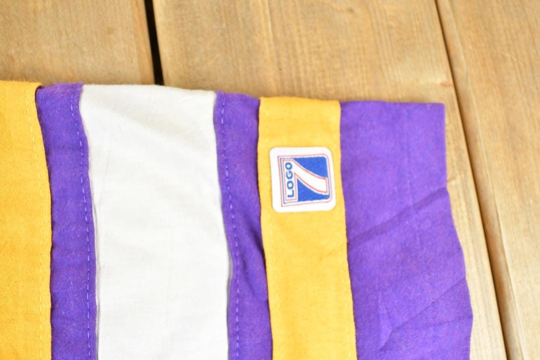 Proper Vintage Clothing > Gender Neutral Adult Clothing > Tops & Tees > T Shirts Vintage 1980s Minnesota Vikings NFL Graphic T-Shirt / Logo 7 Made In USA / Single Stitch / NFL / 90s Streetwear / Sportswear