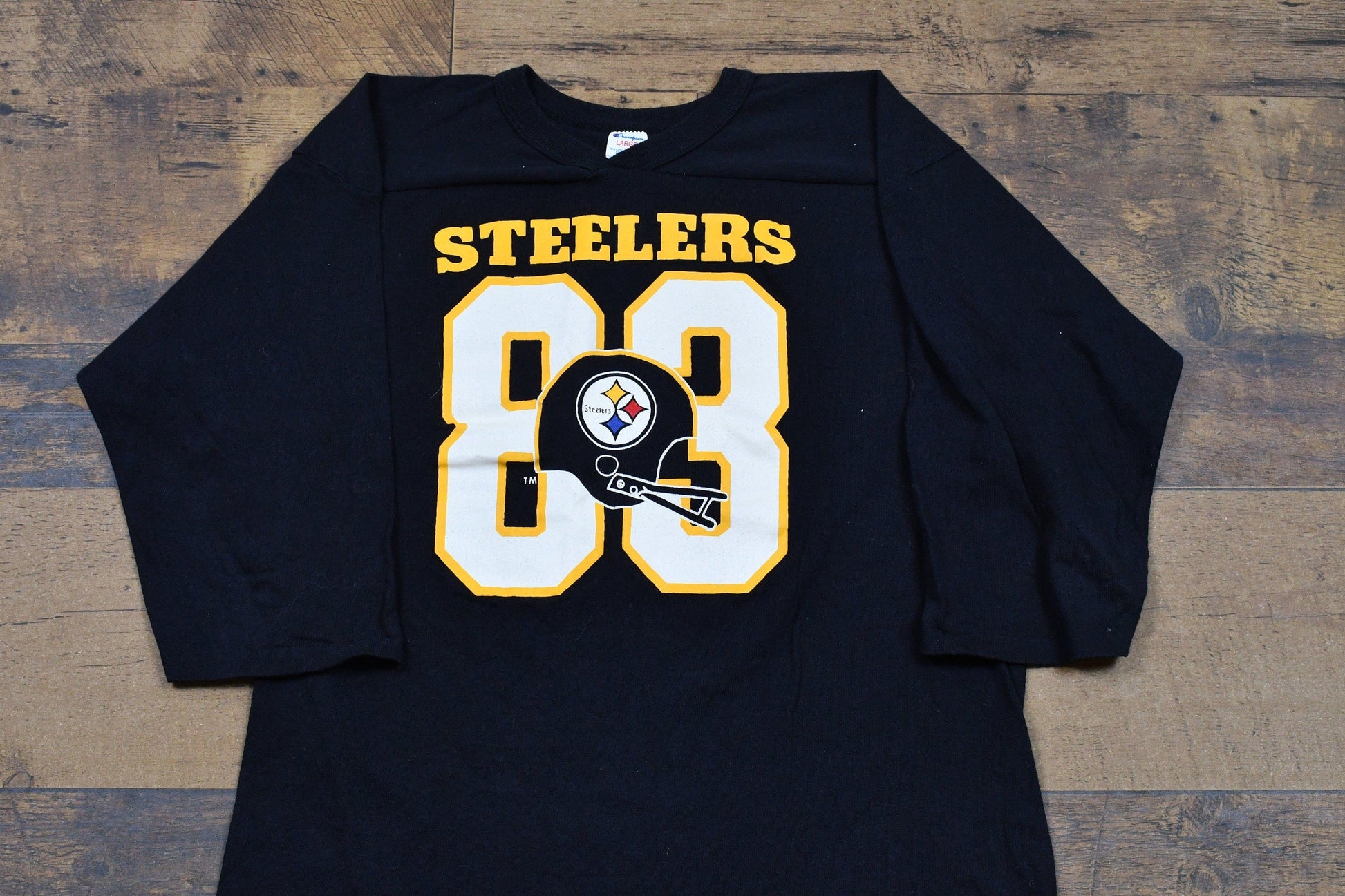 Proper Vintage Clothing > Gender Neutral Adult Clothing > Tops & Tees > T Shirts Vintage 1980s Pittsburgh Steelers Jersey Style Champion T-Shirt / NFL Football / Streetwear / Retro Style / Made In The USA