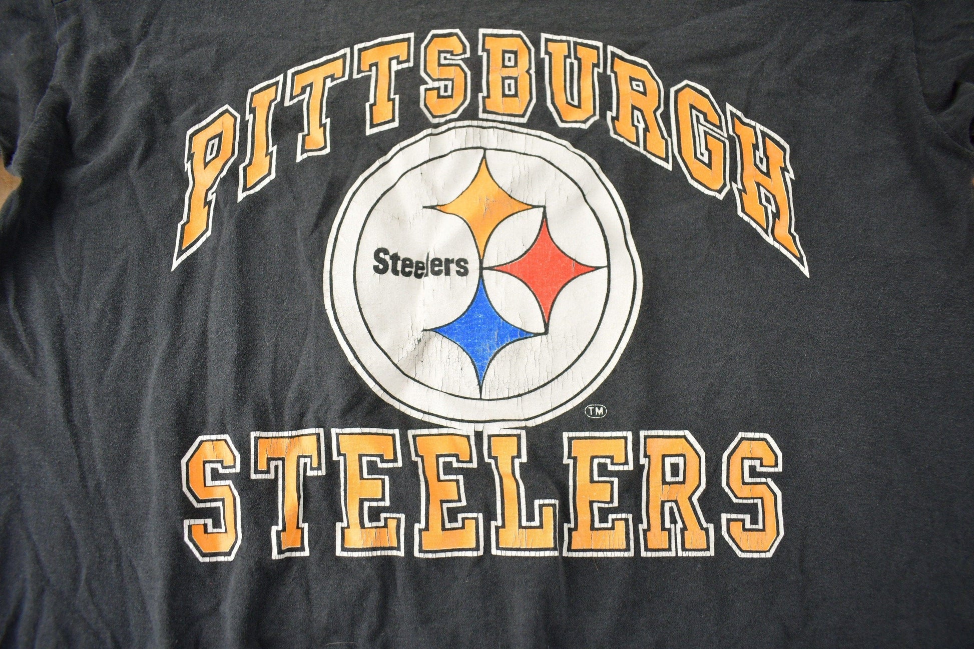 Proper Vintage Clothing > Gender Neutral Adult Clothing > Tops & Tees > T Shirts Vintage 1980s Pittsburgh Steelers NFL Football Graphic T-Shirt Made In USA