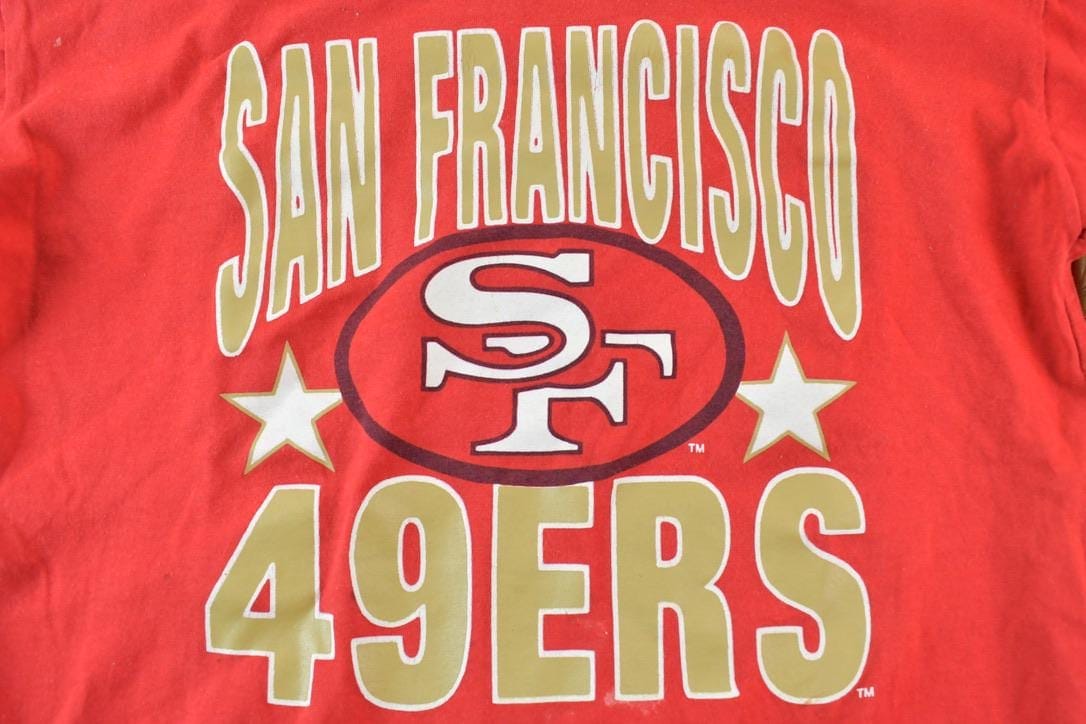 Proper Vintage Clothing > Gender Neutral Adult Clothing > Tops & Tees > T Shirts Vintage 1980s San Francisco Aop NFL Graphic print T-Shirt/ Made In USA / 80s Single Stitch San Fran / NFL / 90s Streetwear