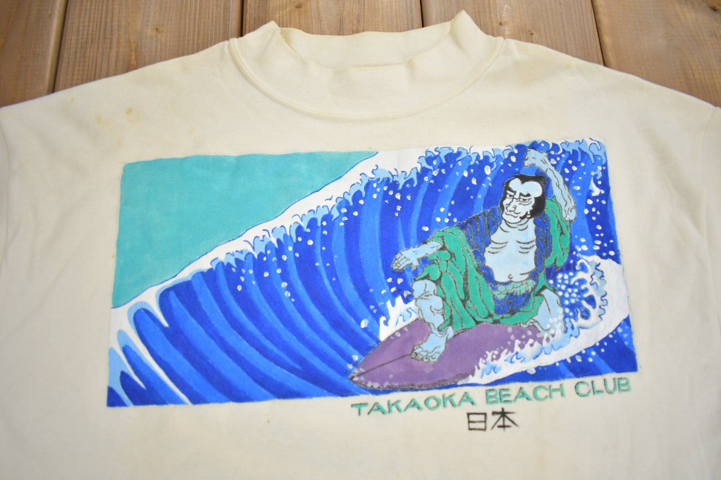 Proper Vintage Clothing > Gender Neutral Adult Clothing > Tops & Tees > T Shirts Vintage 1980s Takaoka Beach Club Surfing Graphic Souvenir T Shirt / Vintage Japan / Made In USA / Vacation Tee / Travel T Shirt / Mockneck