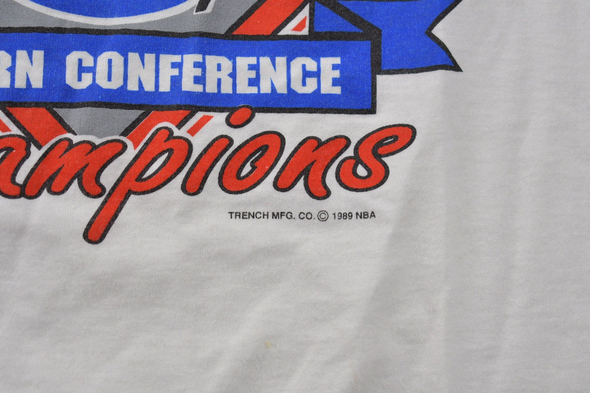 Proper Vintage Clothing > Gender Neutral Adult Clothing > Tops & Tees > T Shirts Vintage 1989 Detroit Pistons NBA Eastern Conference Champions Graphic T-Shirt / Made In USA / Single Stitch / NBA Basketball / Bad Boys