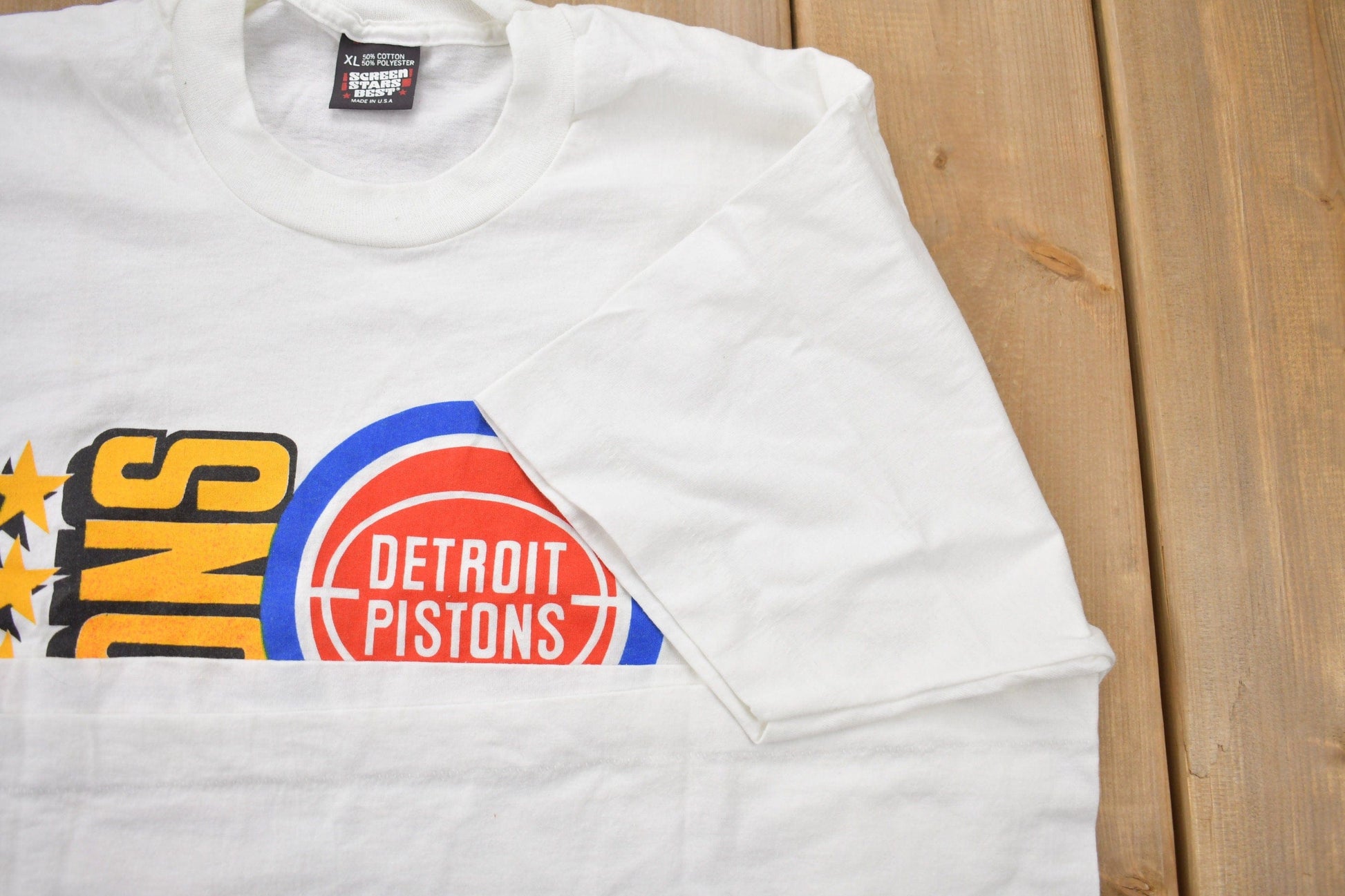 Proper Vintage Clothing > Gender Neutral Adult Clothing > Tops & Tees > T Shirts Vintage 1989 Detroit Pistons NBA World Champions Graphic T-Shirt / Made In USA / Single Stitch / NBA Basketball / Motor City Bad Boys