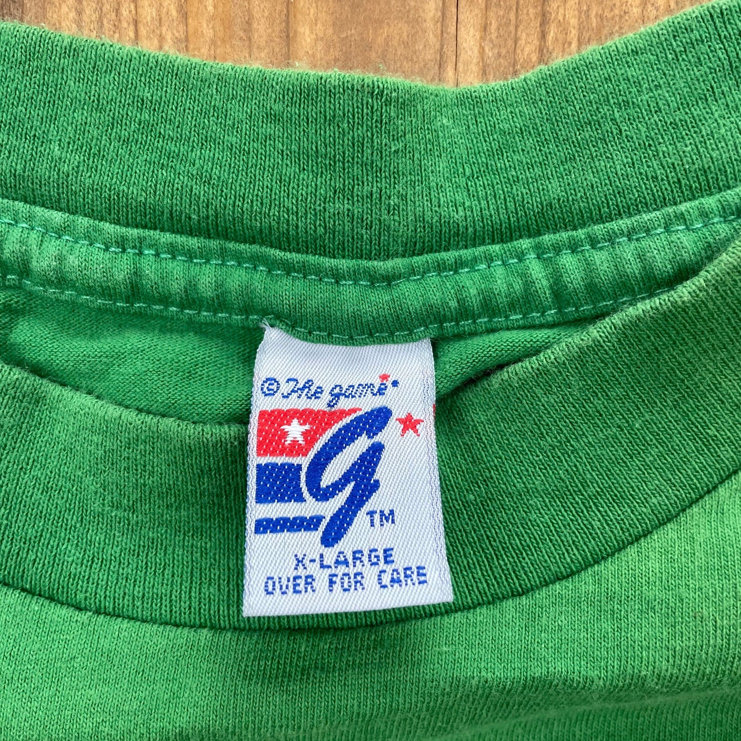 Proper Vintage Clothing > Gender Neutral Adult Clothing > Tops & Tees > T Shirts Vintage 1990s Boston Celtics The Game T-Shirt / Made In USA / Single Stitch / NBA / 90s Streetwear / Athleisure / Sportswear