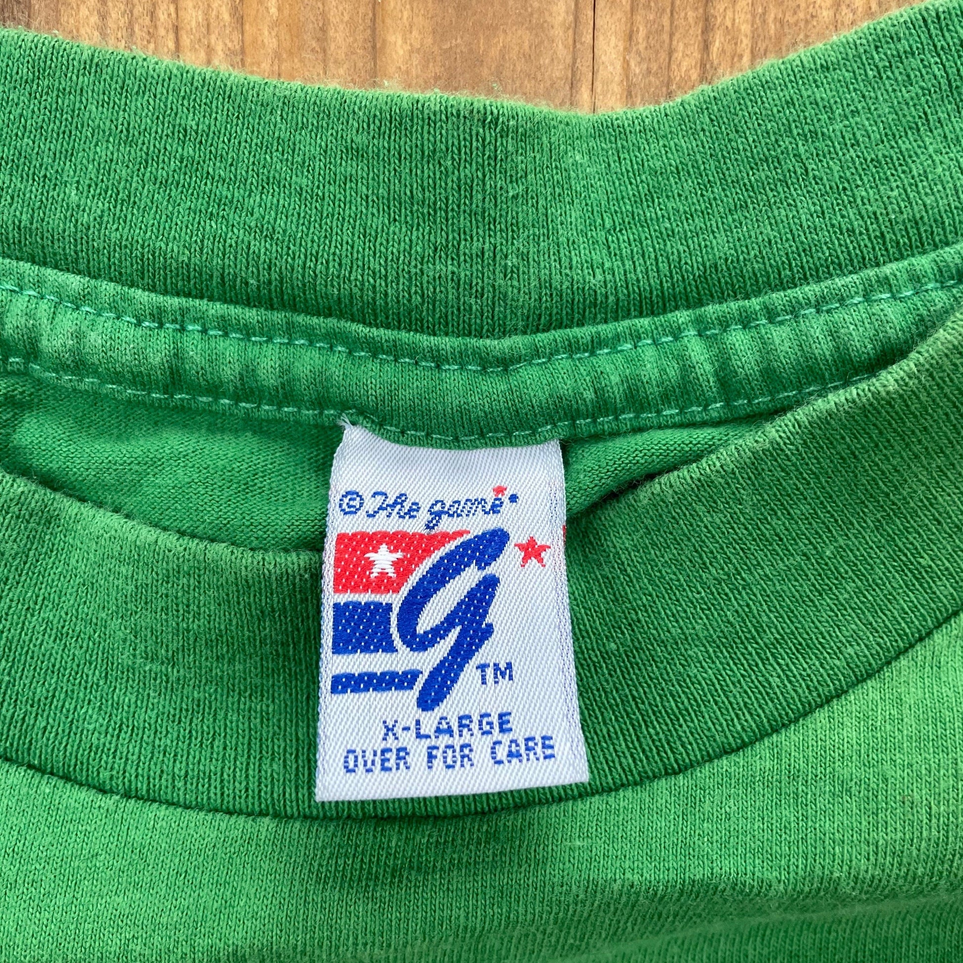 Proper Vintage Clothing > Gender Neutral Adult Clothing > Tops & Tees > T Shirts Vintage 1990s Boston Celtics The Game T-Shirt / Made In USA / Single Stitch / NBA / 90s Streetwear / Athleisure / Sportswear