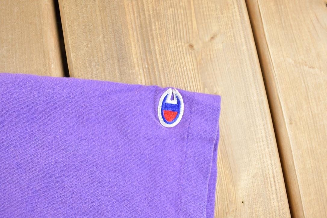 Proper Vintage Clothing > Gender Neutral Adult Clothing > Tops & Tees > T Shirts Vintage 1990s Champion Minnesota Vikings NFL Graphic T-Shirt/ Made In USA / Single Stitch / NFL / 90s Streetwear / Sportswear