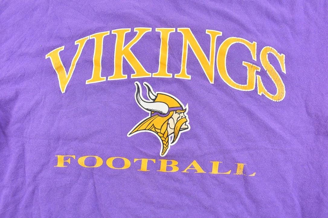 Proper Vintage Clothing > Gender Neutral Adult Clothing > Tops & Tees > T Shirts Vintage 1990s Champion Minnesota Vikings NFL Graphic T-Shirt/ Made In USA / Single Stitch / NFL / 90s Streetwear / Sportswear