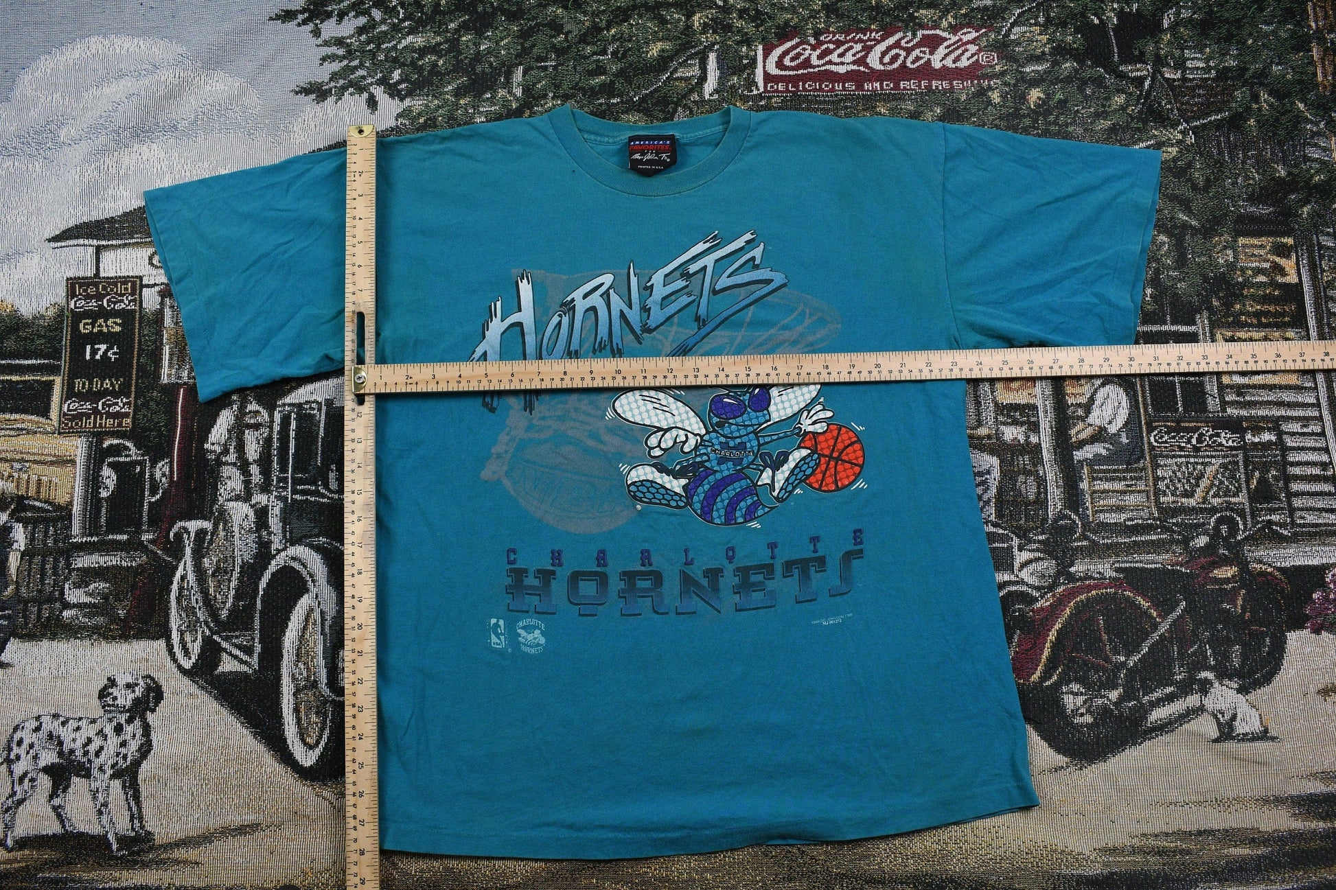Proper Vintage Clothing > Gender Neutral Adult Clothing > Tops & Tees > T Shirts Vintage 1990s Charlotte Hornets NBA Graphic T Shirt / Sportswear / Streetwear Fashion / Retro Style / NBA / Basketball / Made In USA