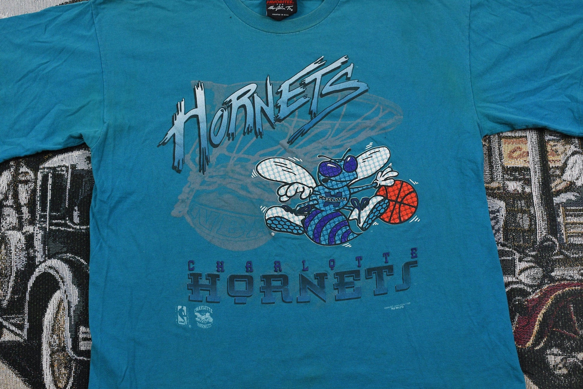 Proper Vintage Clothing > Gender Neutral Adult Clothing > Tops & Tees > T Shirts Vintage 1990s Charlotte Hornets NBA Graphic T Shirt / Sportswear / Streetwear Fashion / Retro Style / NBA / Basketball / Made In USA