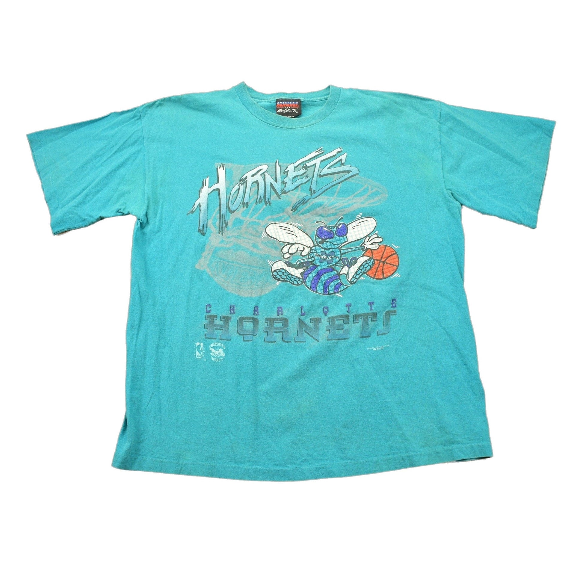 Proper Vintage Clothing > Gender Neutral Adult Clothing > Tops & Tees > T Shirts Vintage 1990s Charlotte Hornets NBA Graphic T Shirt / Sportswear / Streetwear Fashion / Retro Style / NBA / Basketball / Made In USA