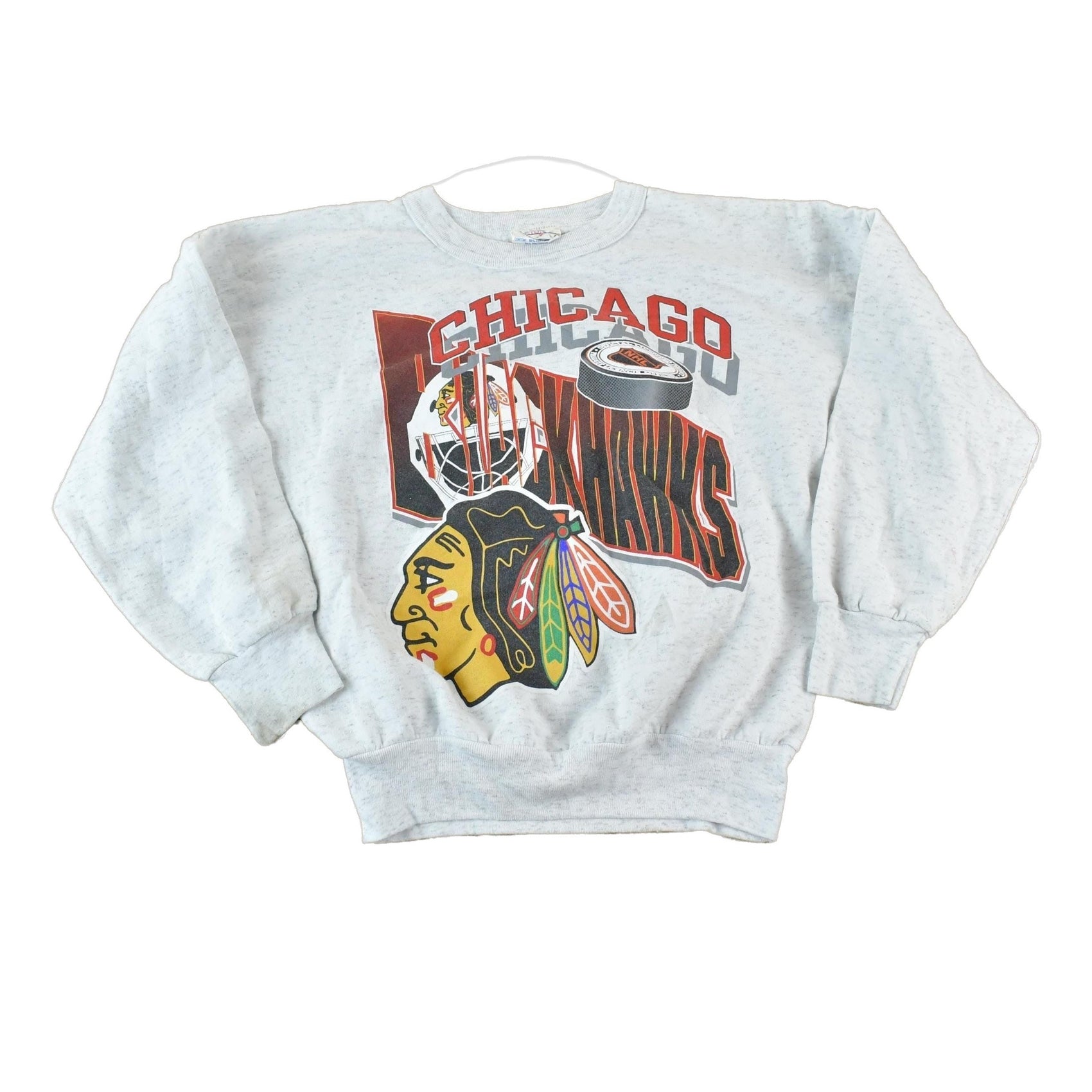 Proper Vintage Clothing > Gender Neutral Adult Clothing > Tops & Tees > T Shirts Vintage 1990s Chicago Blackhawks Youth NHL Graphic Sweater / Made In USA / Single Stitch / NHL Hockey / 90s Streetwear / Sportswear