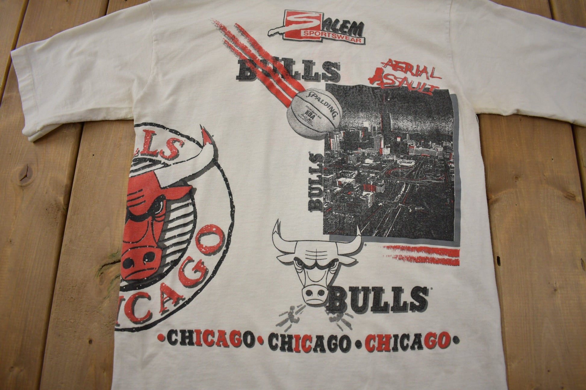 Proper Vintage Clothing > Gender Neutral Adult Clothing > Tops & Tees > T Shirts Vintage 1990s Chicago Bulls NBA Aerial Assault Graphic T-Shirt / Made In USA / Single Stitch / 90s Streetwear / Salem Sportswear