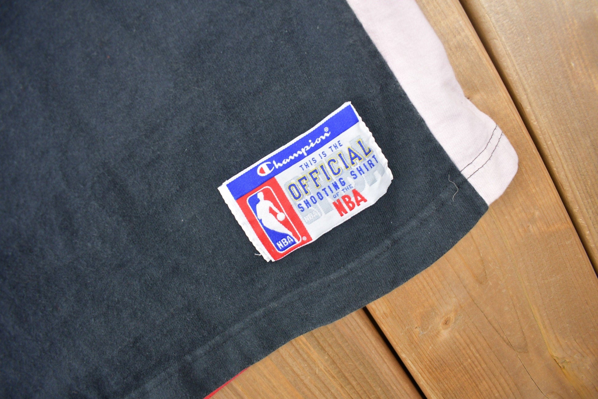 Proper Vintage Clothing > Gender Neutral Adult Clothing > Tops & Tees > T Shirts Vintage 1990s Chicago Bulls NBA Champion Shooting Shirt NBA Sportswear / Vintage Champion / Chicago Bulls Jersey