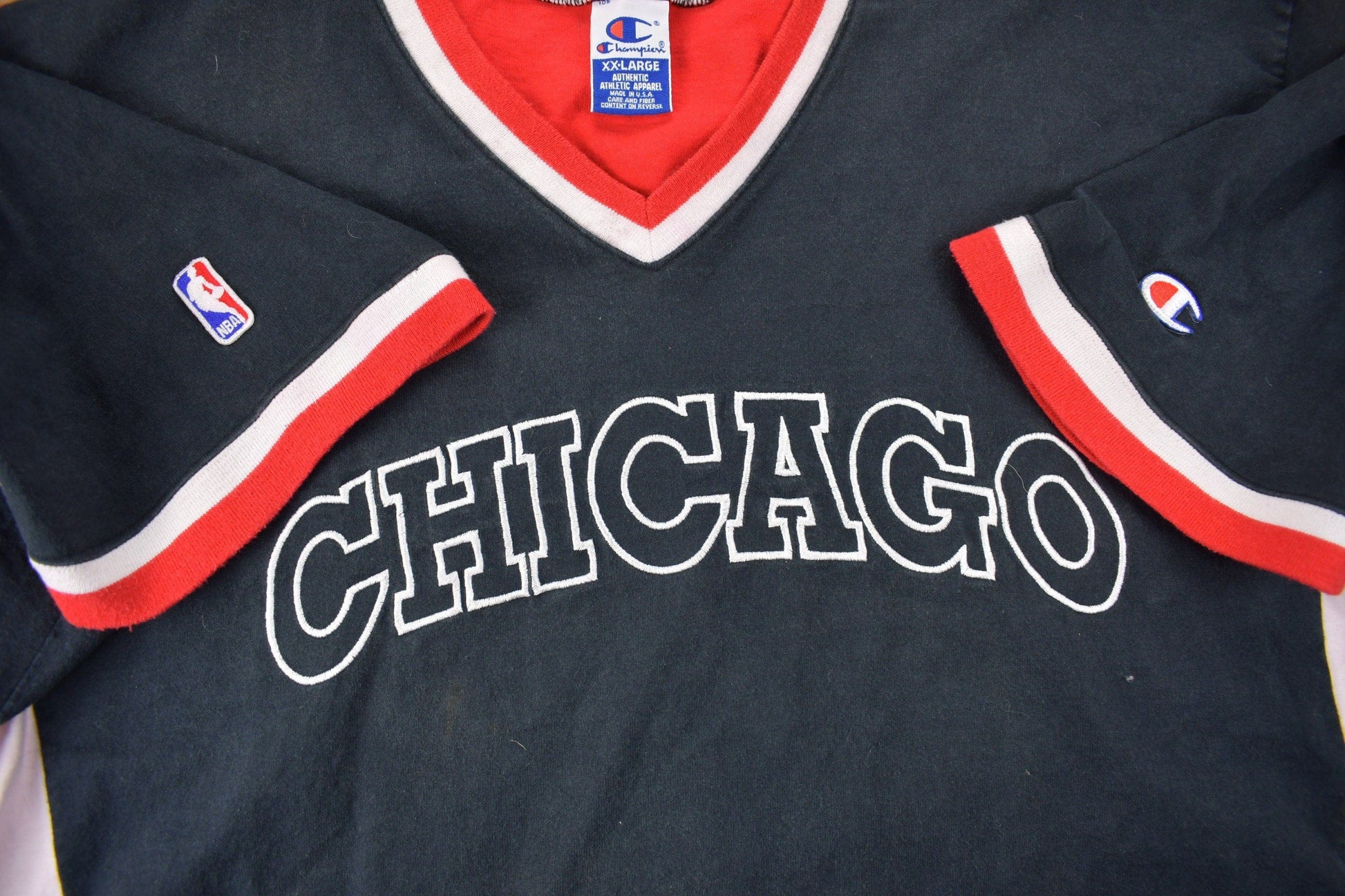 Proper Vintage Clothing > Gender Neutral Adult Clothing > Tops & Tees > T Shirts Vintage 1990s Chicago Bulls NBA Champion Shooting Shirt NBA Sportswear / Vintage Champion / Chicago Bulls Jersey