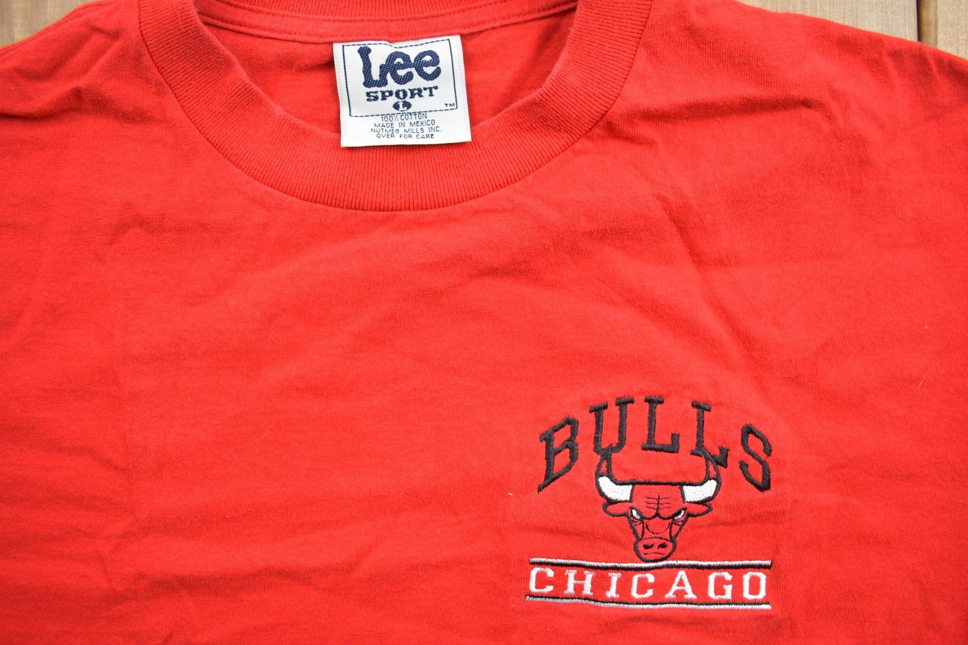 Proper Vintage Clothing > Gender Neutral Adult Clothing > Tops & Tees > T Shirts Vintage 1990s Chicago Bulls Small Logo Lee Graphic T-Shirt / Streetwear / Retro Style / Vintage NBA Gear / 90s Graphic Tee
