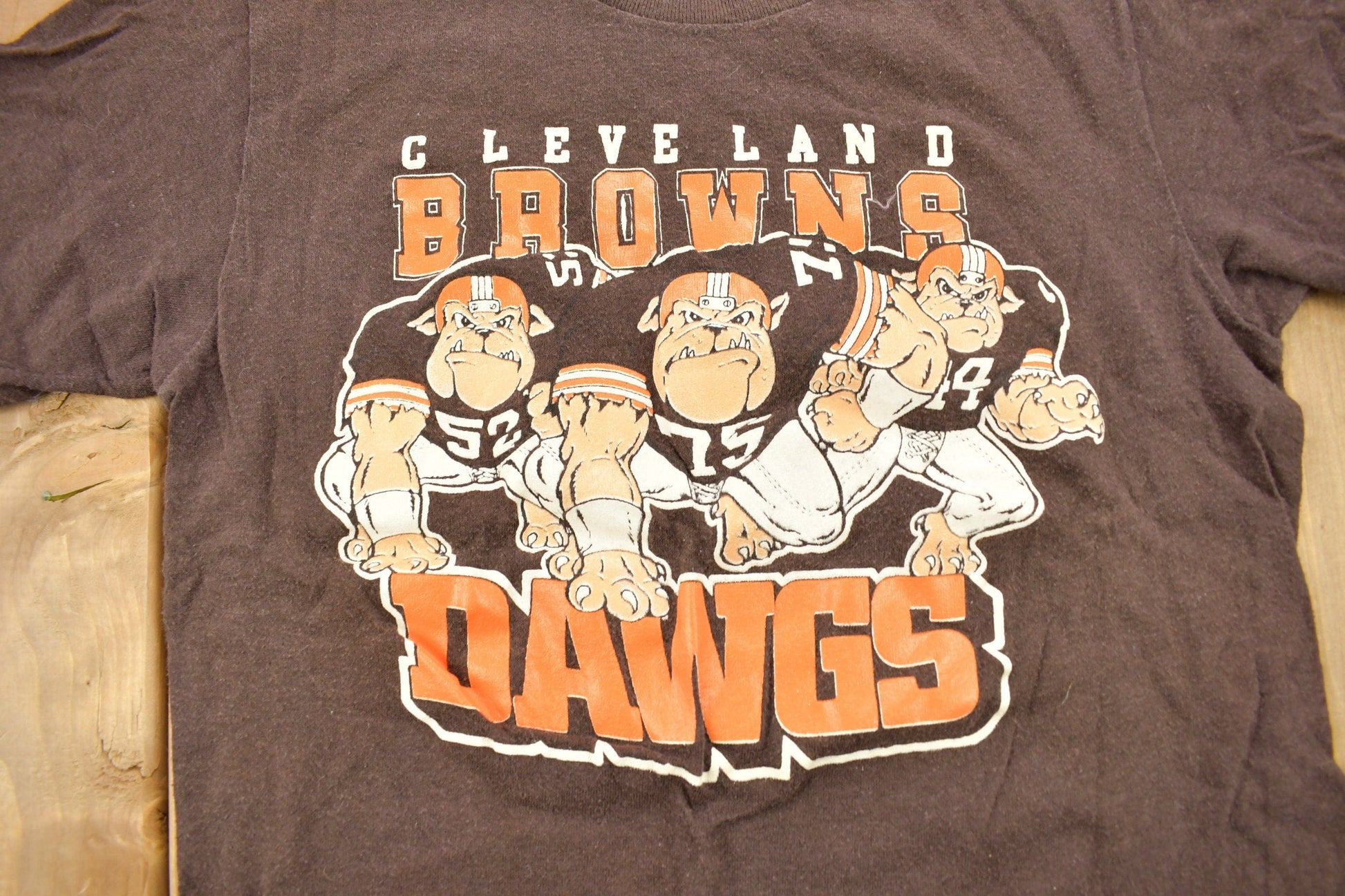 Proper Vintage Clothing > Gender Neutral Adult Clothing > Tops & Tees > T Shirts Vintage 1990s Cleveland Browns Dawgs NFL Graphic Youth Size T-Shirt / Made In USA / Single Stitch / NFL / Logo 7 / Sportswear