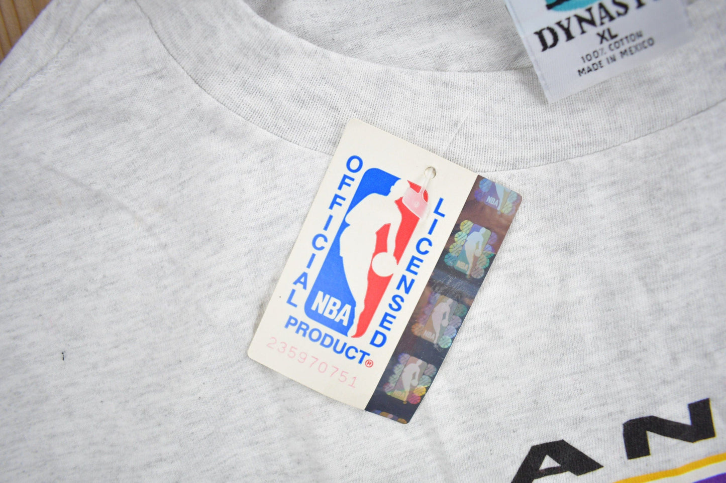 Proper Vintage Clothing > Gender Neutral Adult Clothing > Tops & Tees > T Shirts Vintage 1990s Deadstock Los Angeles Lakers NBA Graphic T-Shirt / NBA Basketball / Vintage Lakers / Sportswear / NWT