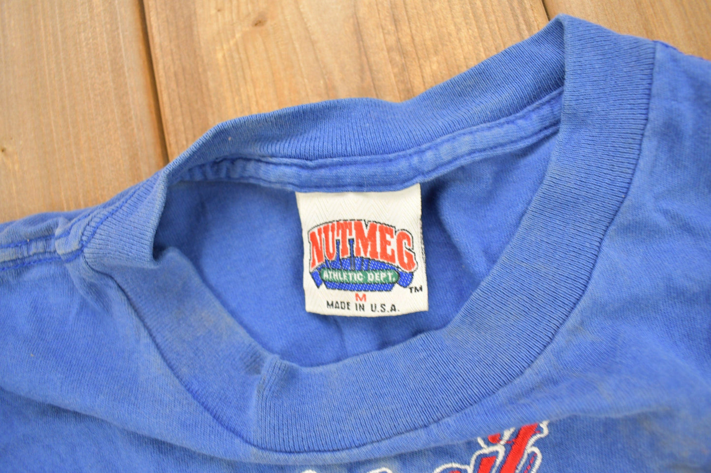 Proper Vintage Clothing > Gender Neutral Adult Clothing > Tops & Tees > T Shirts Vintage 1990s Detroit Pistons NBA Embroidered Graphic T-Shirt / Made In USA / Single Stitch / NBA Basketball / Nutmeg Sportswear
