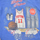 Proper Vintage Clothing > Gender Neutral Adult Clothing > Tops & Tees > T Shirts Vintage 1990s Detroit Pistons NBA Embroidered Graphic T-Shirt / Made In USA / Single Stitch / NBA Basketball / Nutmeg Sportswear