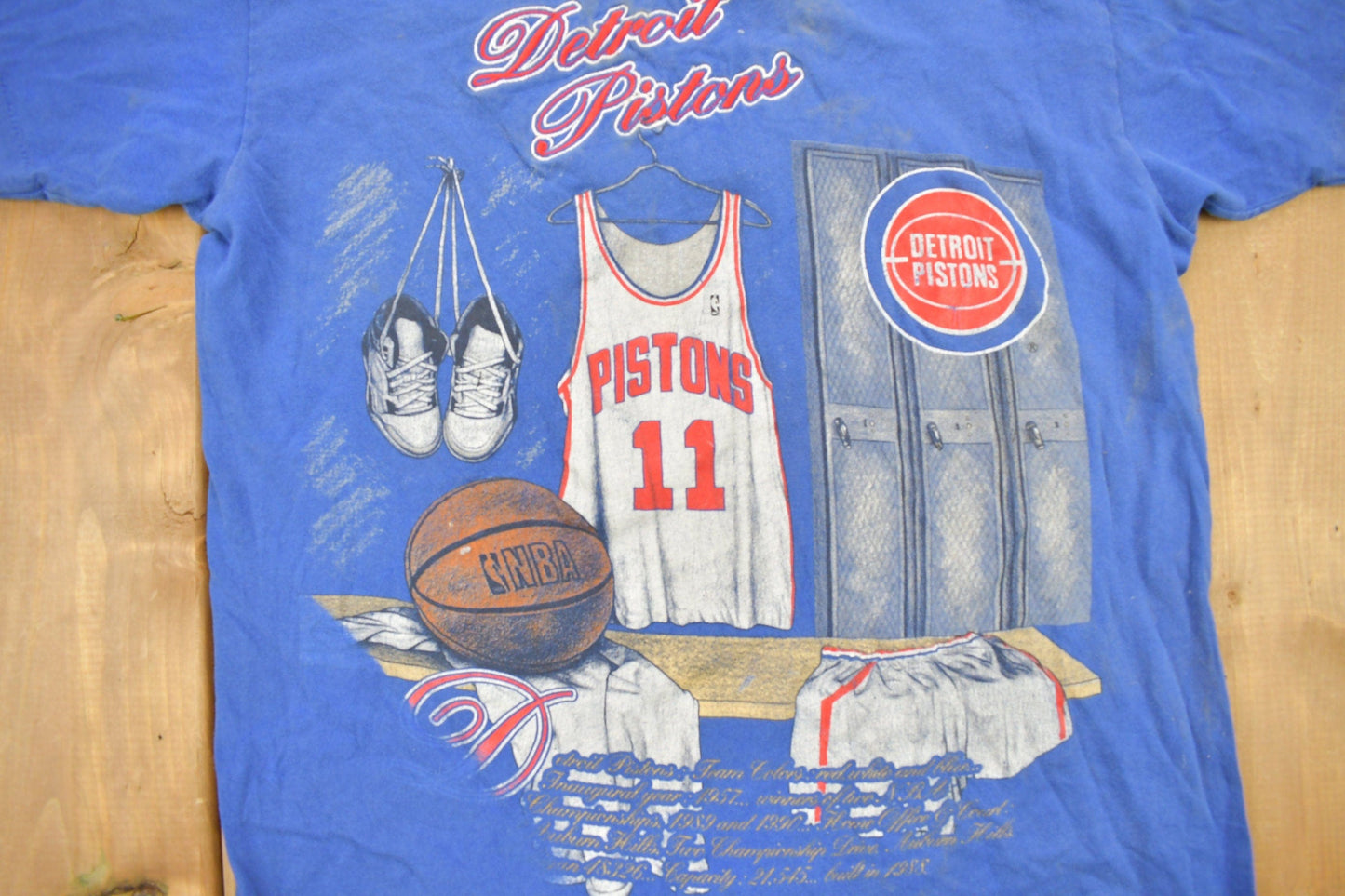 Proper Vintage Clothing > Gender Neutral Adult Clothing > Tops & Tees > T Shirts Vintage 1990s Detroit Pistons NBA Embroidered Graphic T-Shirt / Made In USA / Single Stitch / NBA Basketball / Nutmeg Sportswear