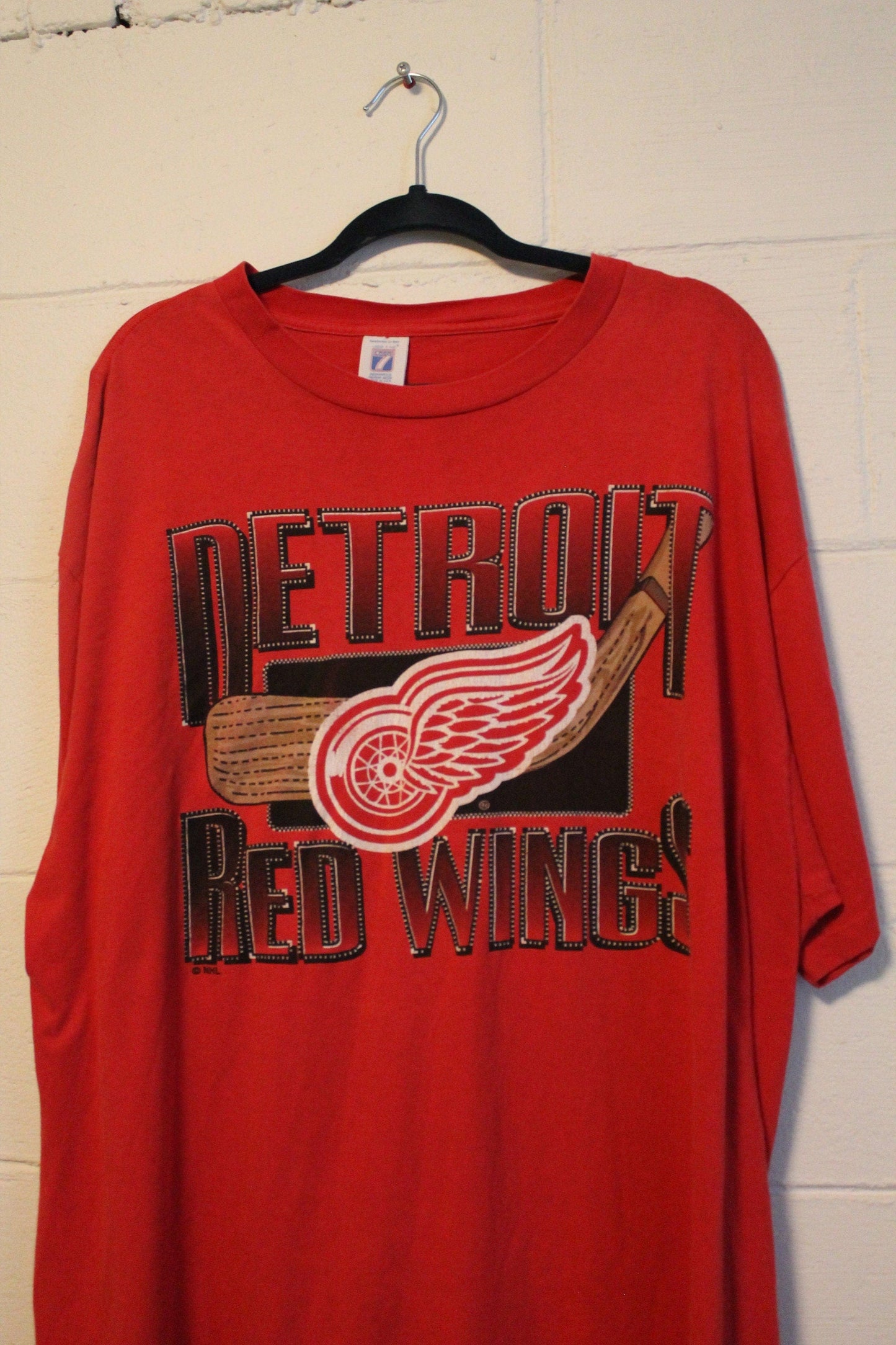 Proper Vintage Clothing > Gender Neutral Adult Clothing > Tops & Tees > T Shirts Vintage 1990s Detroit Red Wings NHL Logo 7 T Shirt / Vintage Graphic T-Shirt / 80s / 90s / Made In USA / Hockey T Shirt