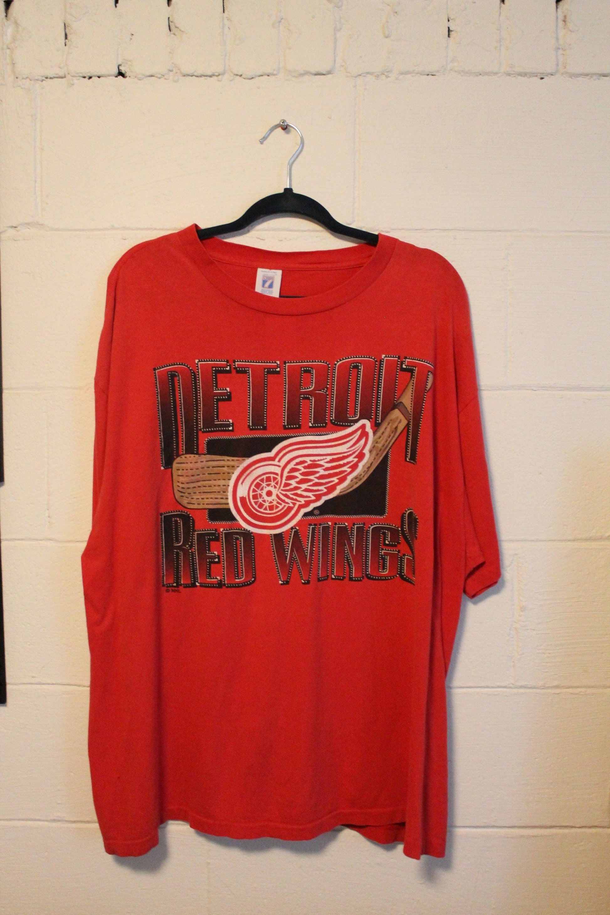 Proper Vintage Clothing > Gender Neutral Adult Clothing > Tops & Tees > T Shirts Vintage 1990s Detroit Red Wings NHL Logo 7 T Shirt / Vintage Graphic T-Shirt / 80s / 90s / Made In USA / Hockey T Shirt