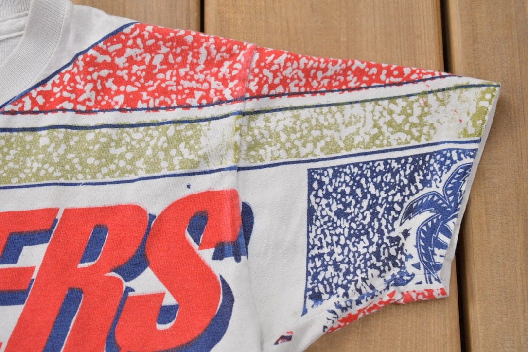 Proper Vintage Clothing > Gender Neutral Adult Clothing > Tops & Tees > T Shirts Vintage 1990s Florida Panthers All Over Print NHL Graphic Kids T-Shirt Made In Canada / Single Stitch / NHL Hockey / 90s Salem