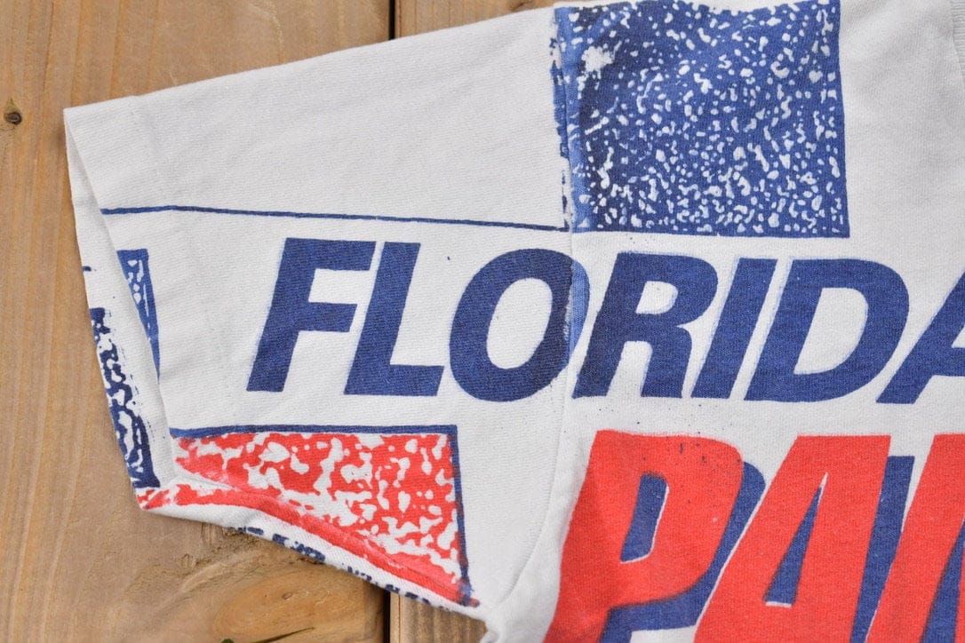 Proper Vintage Clothing > Gender Neutral Adult Clothing > Tops & Tees > T Shirts Vintage 1990s Florida Panthers All Over Print NHL Graphic Kids T-Shirt Made In Canada / Single Stitch / NHL Hockey / 90s Salem