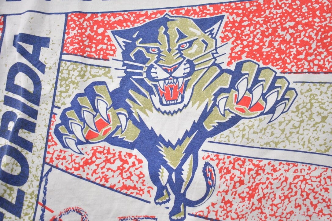Proper Vintage Clothing > Gender Neutral Adult Clothing > Tops & Tees > T Shirts Vintage 1990s Florida Panthers All Over Print NHL Graphic Kids T-Shirt Made In Canada / Single Stitch / NHL Hockey / 90s Salem