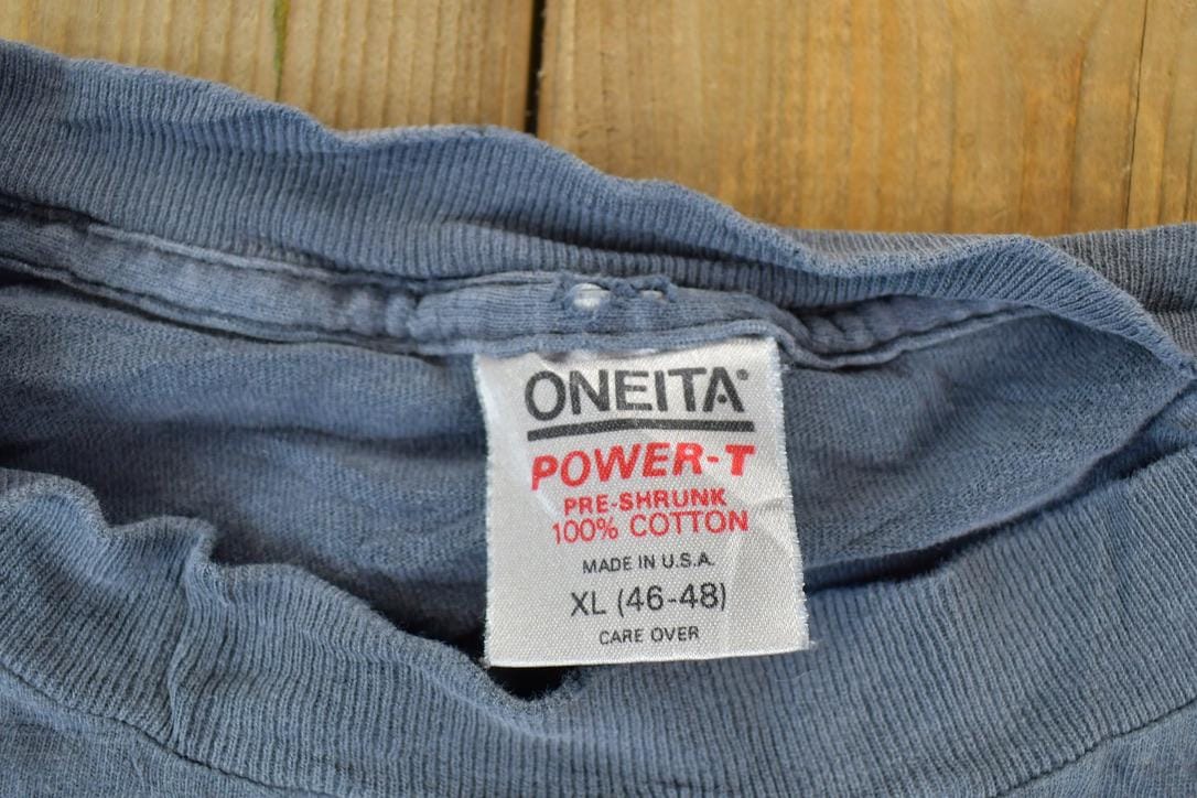 Proper Vintage Clothing > Gender Neutral Adult Clothing > Tops & Tees > T Shirts Vintage 1990s Minnesota North Stars NHL Graphic T-Shirt / Made In USA / Single Stitch / NHL Hockey / 90s Streetwear / Sportswear