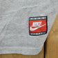 Proper Vintage Clothing > Gender Neutral Adult Clothing > Tops & Tees > T Shirts Vintage 1990s Nike Chicago Bulls NBA Graphic T-Shirt / Swoosh / Nike Swoosh / Nike Vintage / Small Swoosh / Big Swoosh / Nike Check