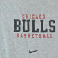 Proper Vintage Clothing > Gender Neutral Adult Clothing > Tops & Tees > T Shirts Vintage 1990s Nike Chicago Bulls NBA Graphic T-Shirt / Swoosh / Nike Swoosh / Nike Vintage / Small Swoosh / Big Swoosh / Nike Check