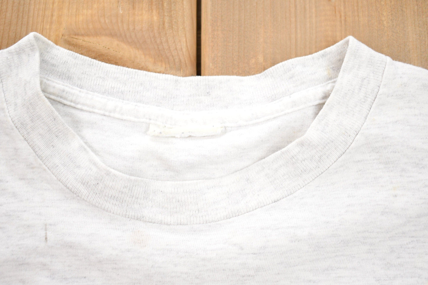 Proper Vintage Clothing > Gender Neutral Adult Clothing > Tops & Tees > T Shirts Vintage 1990s Orlando Magic Graphic T-Shirt / 90s Nutmeg T-Shirt / Streetwear / Retro Style / Single Stitch / Made In USA / NBA Graphic Tee