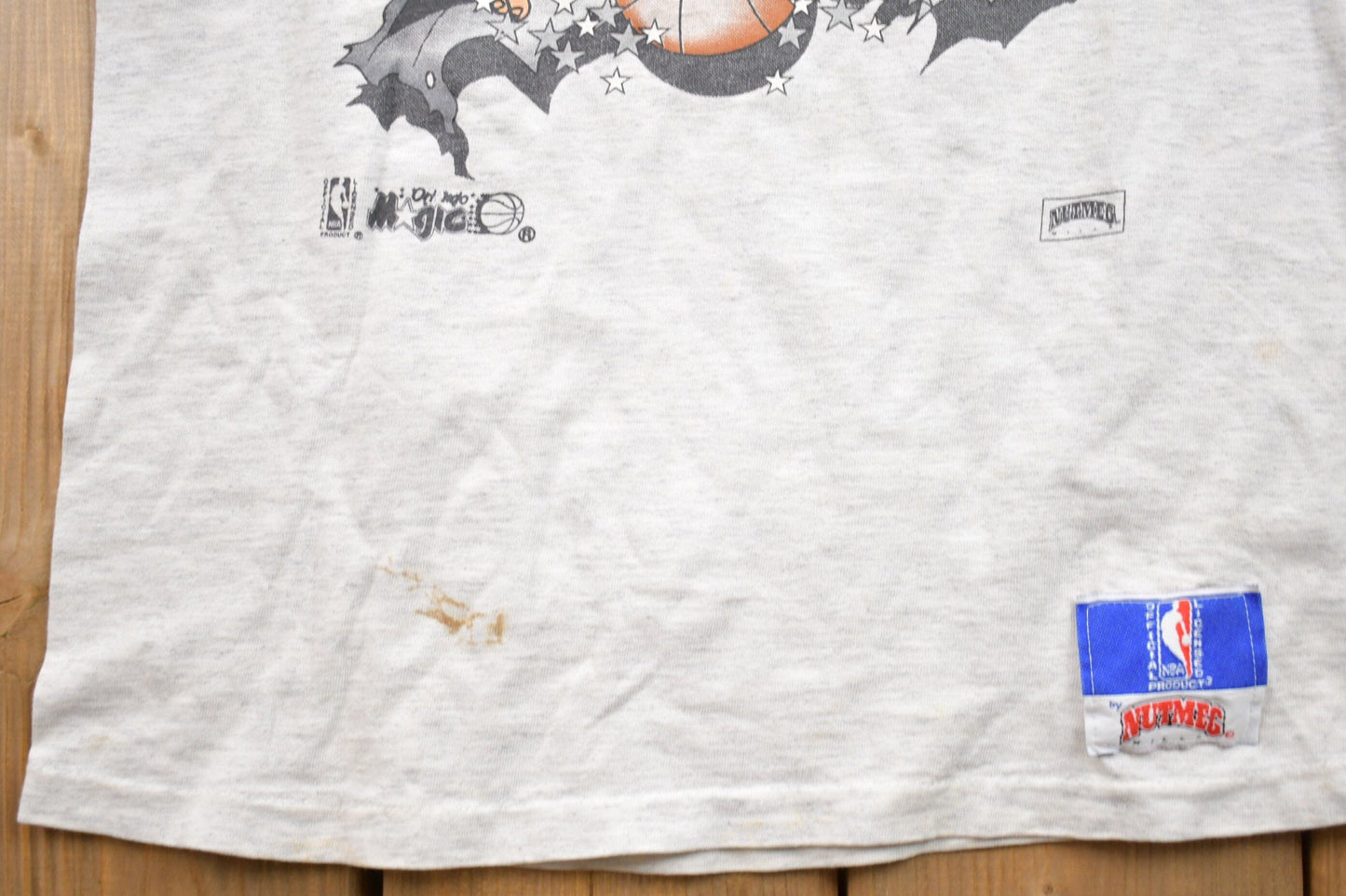 Proper Vintage Clothing > Gender Neutral Adult Clothing > Tops & Tees > T Shirts Vintage 1990s Orlando Magic Graphic T-Shirt / 90s Nutmeg T-Shirt / Streetwear / Retro Style / Single Stitch / Made In USA / NBA Graphic Tee