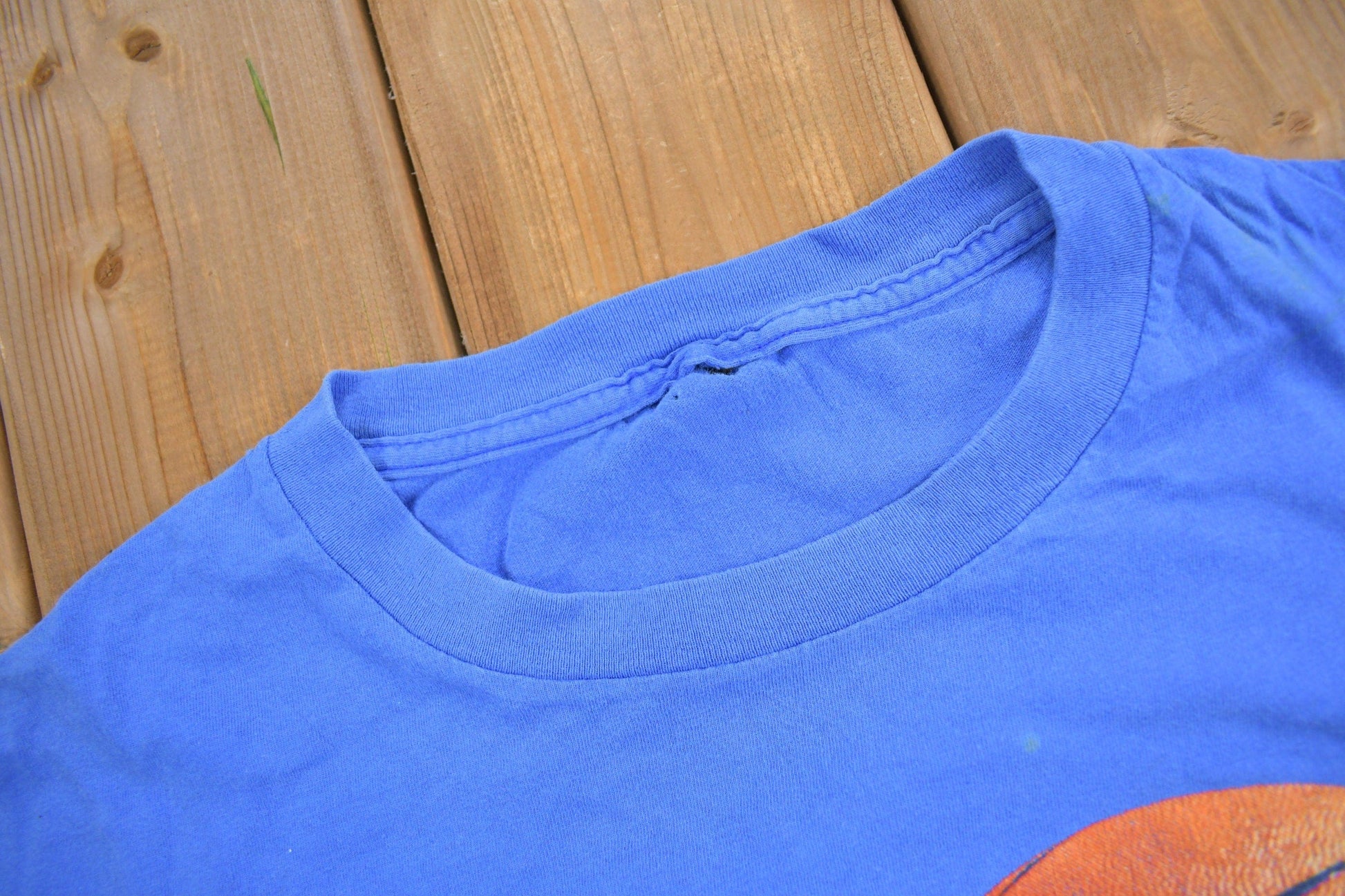 Proper Vintage Clothing > Gender Neutral Adult Clothing > Tops & Tees > T Shirts Vintage 1990s Orlando Magic Graphic T-Shirt / Magic Tee / Streetwear / Retro Style / NBA Graphic Tee