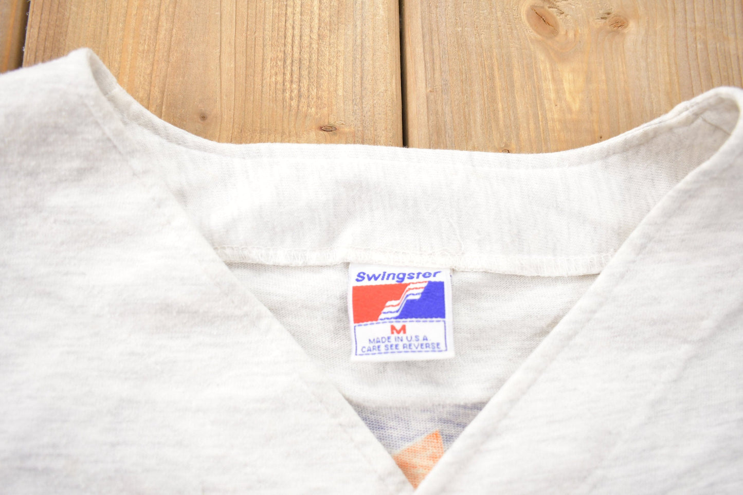 Proper Vintage Clothing > Gender Neutral Adult Clothing > Tops & Tees > T Shirts Vintage 1990s Phoenix Suns NBA Graphic Button Up T-Shirt / Made In USA / Single Stitch / NBA Basketball / 90s Streetwear / Sportswear