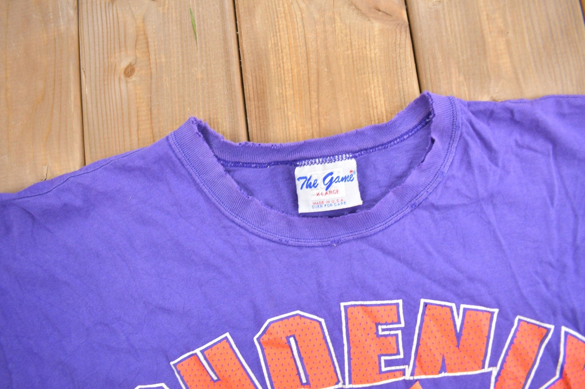 Proper Vintage Clothing > Gender Neutral Adult Clothing > Tops & Tees > T Shirts Vintage 1990s Phoenix Suns NBA Graphic T-Shirt / Made In USA / Single Stitch / NBA Basketball / 90s Streetwear / Sportswear