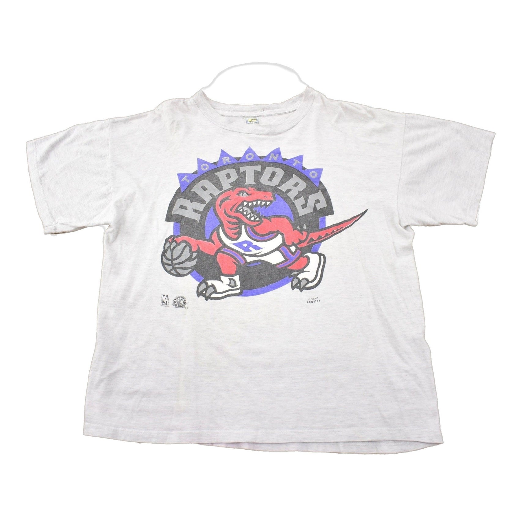 Proper Vintage Clothing > Gender Neutral Adult Clothing > Tops & Tees > T Shirts Vintage 1990s Toronto Raptors NBA Graphic T-Shirt / Made In USA / Sportswear / Vintage NBA