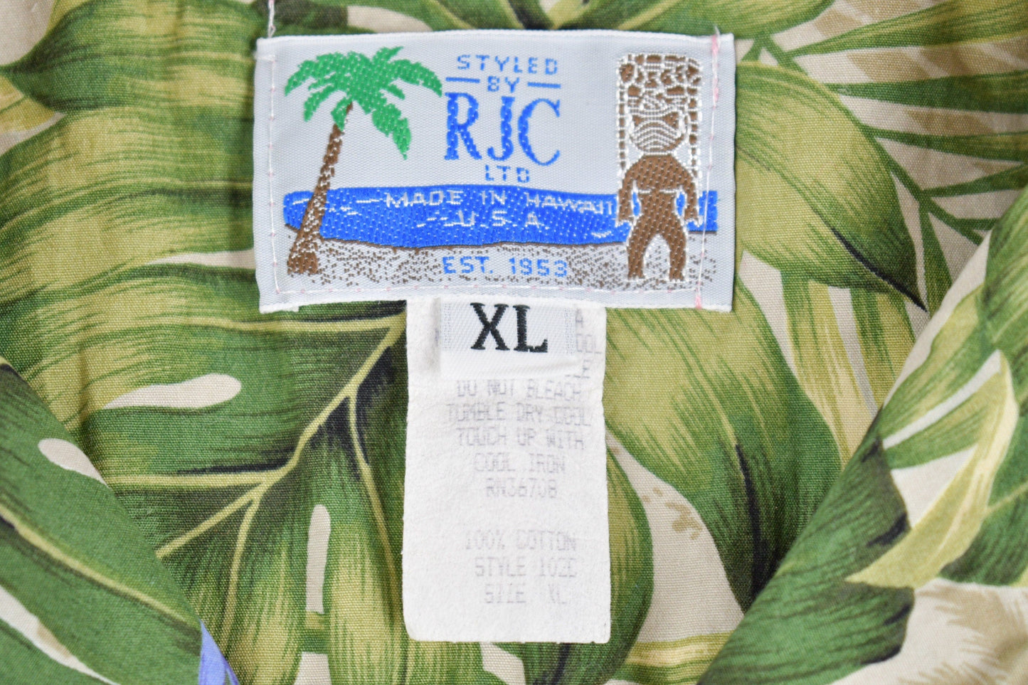 Proper Vintage Clothing > Men's Clothing > Shirts & Tees > Oxfords & Button Downs Vintage 1980s All Over Print Hawaiian Button Up Shirt / Camp Collar / Floral Print / Beachwear / Parrots / Resort Wear / All Over Print