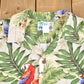 Proper Vintage Clothing > Men's Clothing > Shirts & Tees > Oxfords & Button Downs Vintage 1980s All Over Print Hawaiian Button Up Shirt / Camp Collar / Floral Print / Beachwear / Parrots / Resort Wear / All Over Print