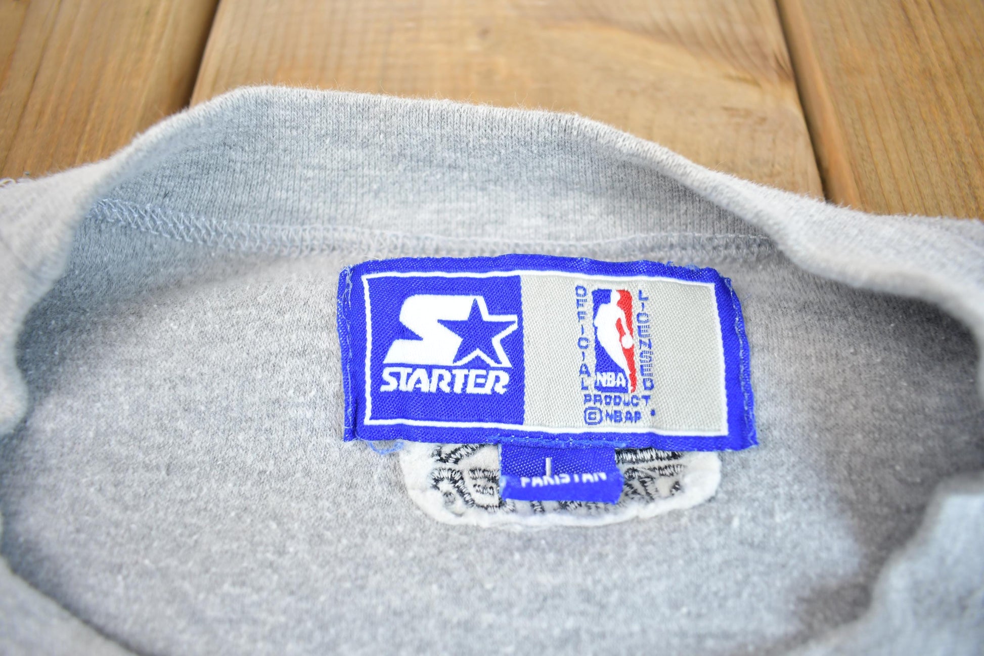 Starter Clothing > Gender Neutral Adult Clothing > Hoodies & Sweatshirts > Sweatshirts Vintage 1990s NBA Starter Chicago Bulls Embroidered Fleece Sweater
